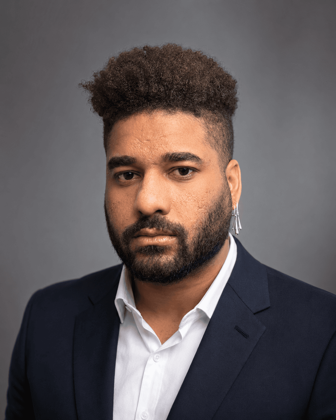 Professional headshot of Joshua Amado