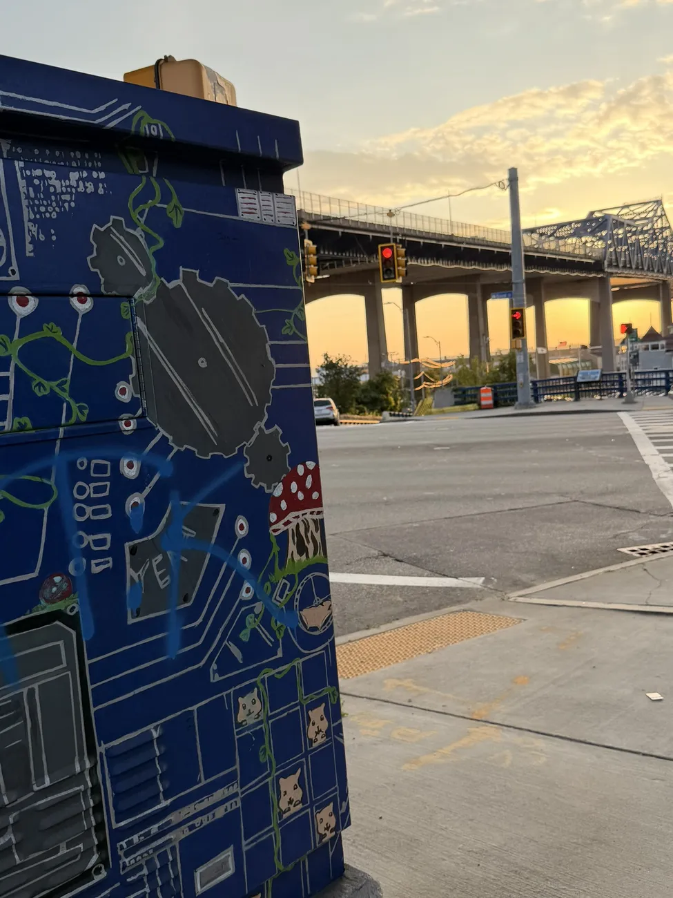 A utility box painted with circuit-board artwork — small-scale public art.